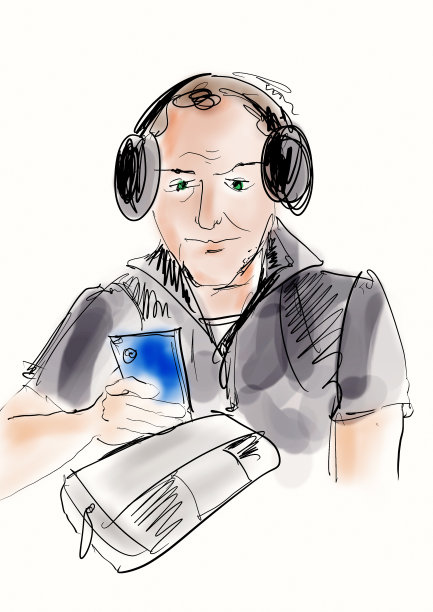 一个戴着耳机拿着手机的男人图片下载