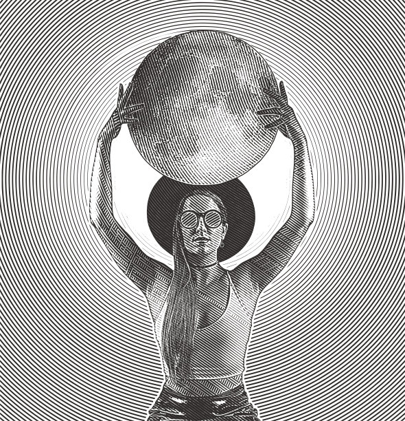 年轻的潮女人穿着露脐上衣戴着太阳眼镜捧着月亮或地球图片下载