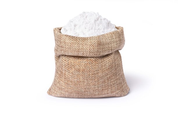 白色粉末在麻袋袋上隔离白色图片下载