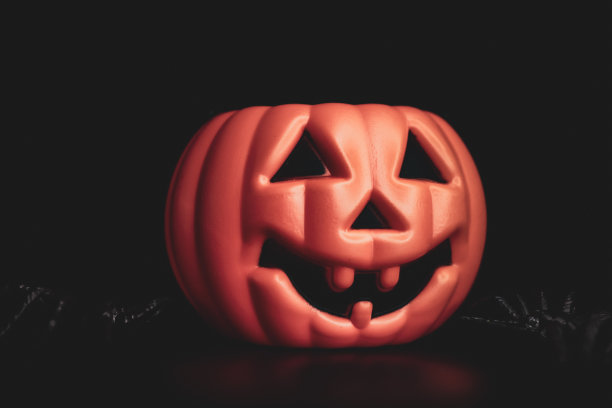 万圣节的概念与一个邪恶的南瓜图片下载