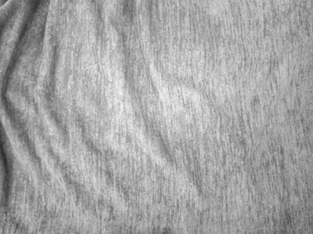 柔软和光滑的灰色缎面背景。设计背景，面料，模板。模糊的图片下载