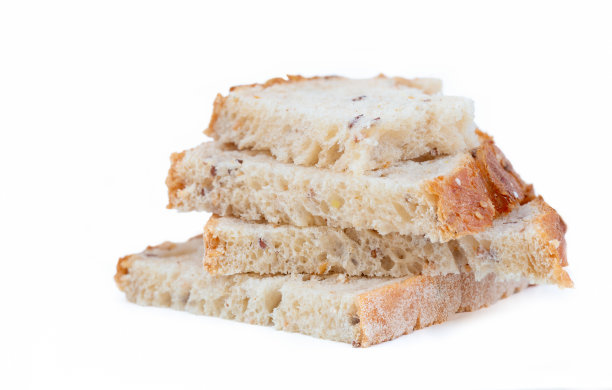 切片的面包，一片叠在另一片上。图片下载