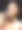 女性与假面威尼斯面具在手近脸。金色女孩在黑色背景图片下载