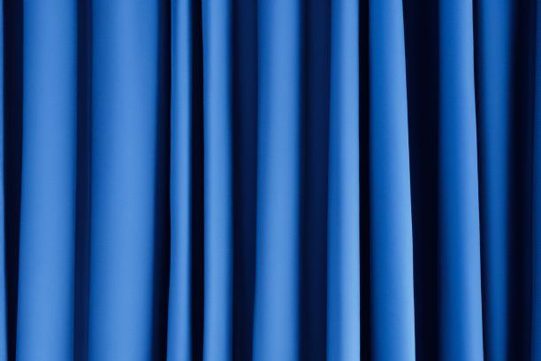 蓝色窗帘纹理背景的特写图片下载
