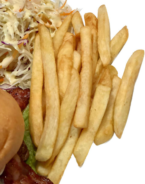 一盘食物的照片，里面有三明治和炸薯条，奶酪汉堡和薯条，盘子里有凉拌卷心菜。图片下载