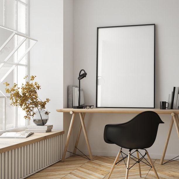 桌子上的海报框架模型。家庭办公室。阁楼背景与当代设计。现代室内设计。三维渲染图片下载