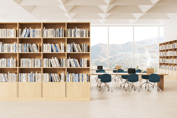 时尚的图书馆内部有书架和书桌，笔记本电脑，窗户图片下载