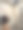 一名印度男子在淋浴间洗头，洗发水泡沫被流水冲洗掉，他抬头看，架子上的洗漱瓶，棕色马赛克瓷砖的墙壁，侧面视图，聚焦于前景图片下载