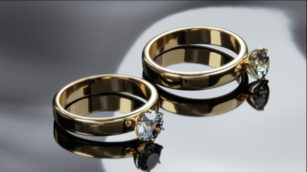 两个金钻戒在摄影棚的场景里。从设计到3D渲染。图片下载