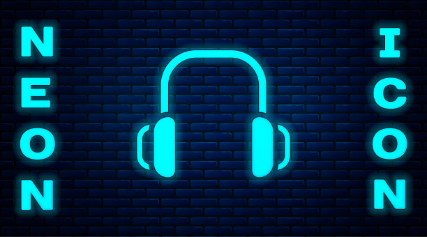 发光的霓虹冬季耳机图标孤立的砖墙背景。耳罩的迹象。向量图片下载