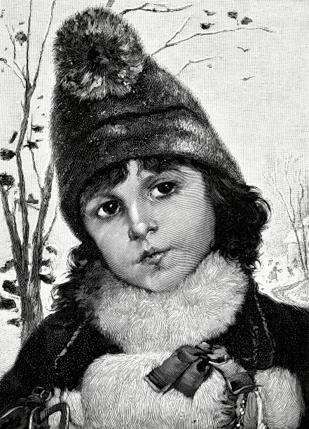 一个穿着暖和的年轻女孩在外面过冬图片下载