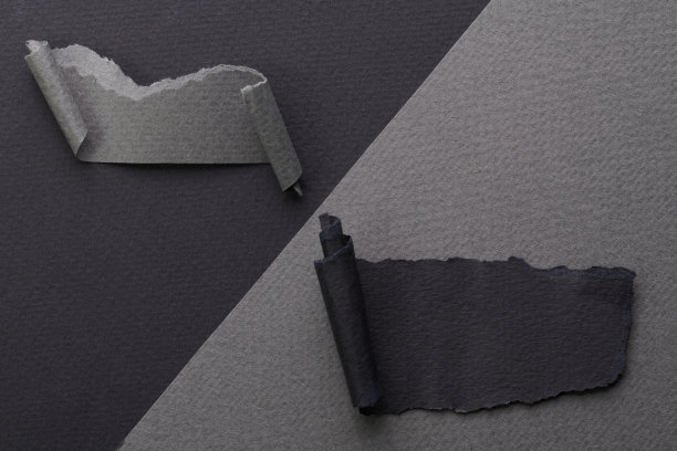 边缘被撕破的纸片的艺术拼贴。便签收集灰黑色的颜色，笔记本页的碎片。抽象的背景图片下载