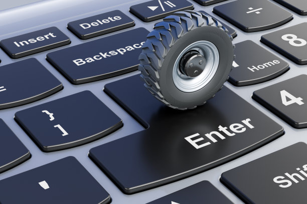卡车车轮在笔记本电脑键盘上。三维渲染图片下载