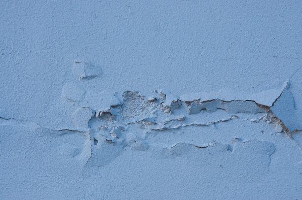 旧混凝土的纹理，浅蓝色粉刷的墙壁与裂缝图片下载