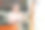 一位年长的女士在乳品部挑选牛奶，微笑着看着镜头图片下载