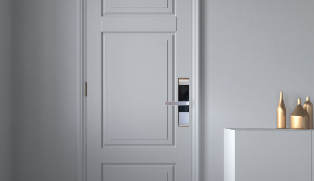 白色门上安装数字门锁。图片下载