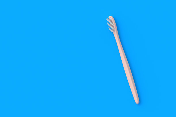 蓝色背景的牙刷。卫生保健配件。前视图。副本的空间。三维渲染图片下载
