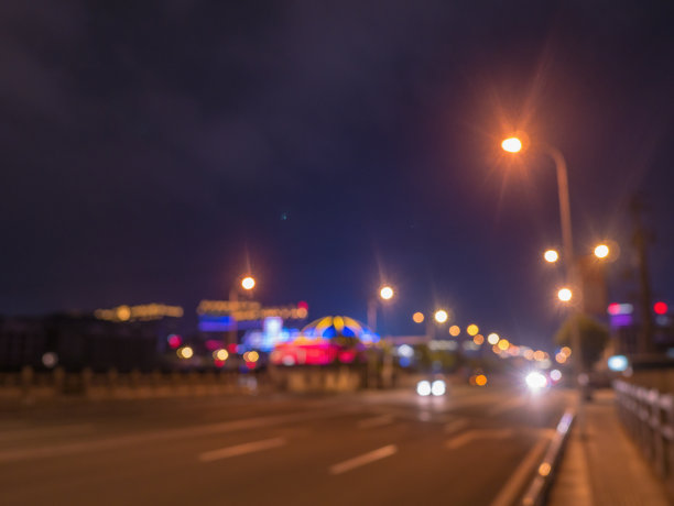 抽象模糊照片张家界美丽的城市建筑场景在夜晚的假期时间。张家界市中国旅游图片下载