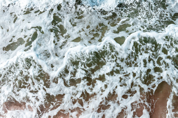 海水与波浪和泡沫，俯视图，抽象的背景照片纹理图片下载