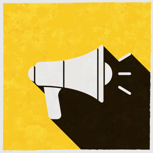 扩音器。图标与长阴影的纹理黄色背景图片下载