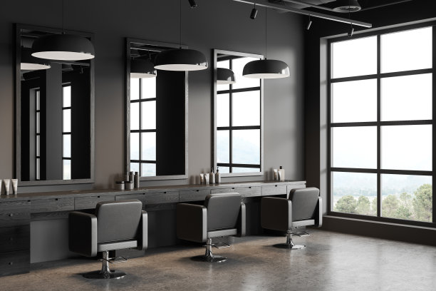灰色的理发店，有扶手椅和带镜子的桌子，全景窗户图片下载