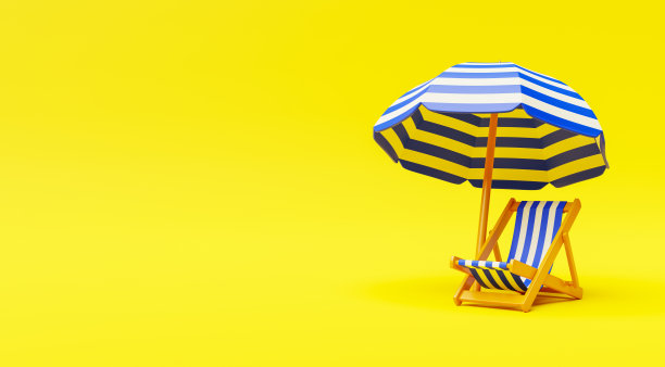 沙滩椅和沙滩伞在黄色的背景与复制空间在左边图片下载