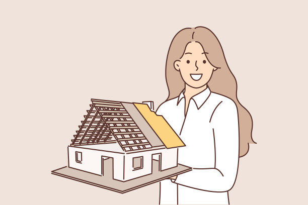 女建筑师手持房屋模型，展示建筑工程解决方案图片下载