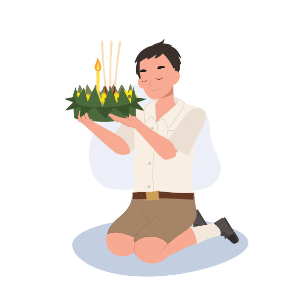 端午节传统节日。泰国一名学生正坐着，举着水饺在河中漂浮前许愿。图片下载