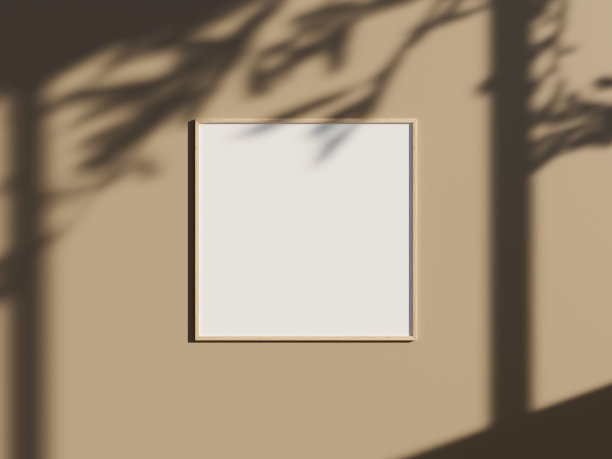 最小的图片海报框架模型在墙上与窗户的阴影和树叶图片下载