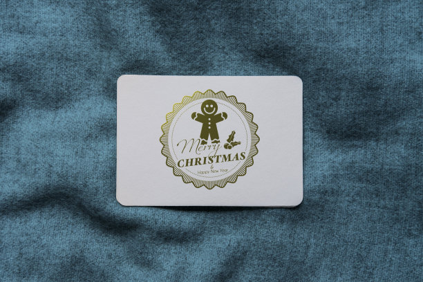 镶有圣诞徽章的镀金圣诞卡图片下载