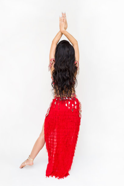 一个美丽的黑发女孩从东方舞蹈学院在传统服装的肖像，股票照片图片下载