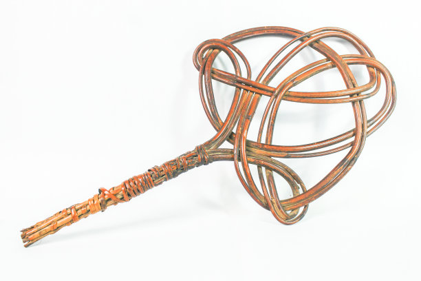 印尼传统的床垫打暖器，由藤条制成图片下载