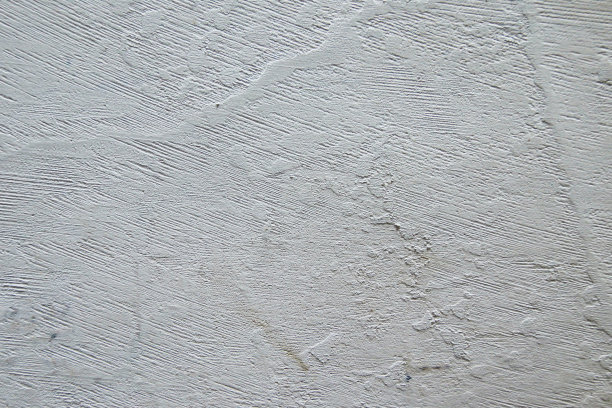 粗糙的白色墙面纹理背景。照片的股票图片下载