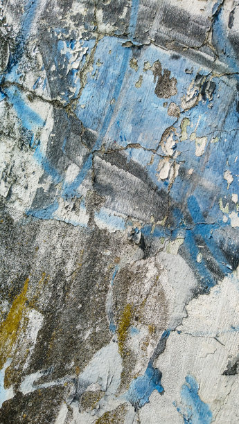 垃圾旧风化混凝土墙与开裂剥落多个白色，黑色，灰色，橄榄绿和蓝色油漆层高分辨率背景纹理库存照片图片下载