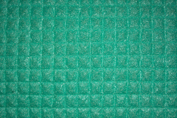 浅绿色背景的正方形。这种织物呈浅绿色，呈细方格。图片下载