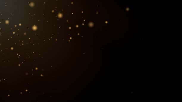 节日抽象圣诞纹理，金色散景颗粒和亮点在黑暗的背景。高质量照片图片下载