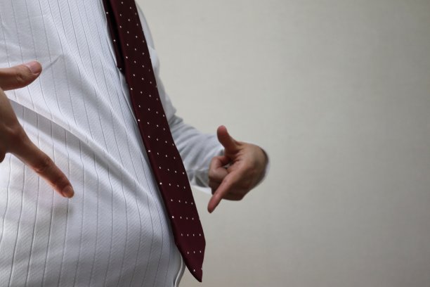 一个胖商人的形象图片下载