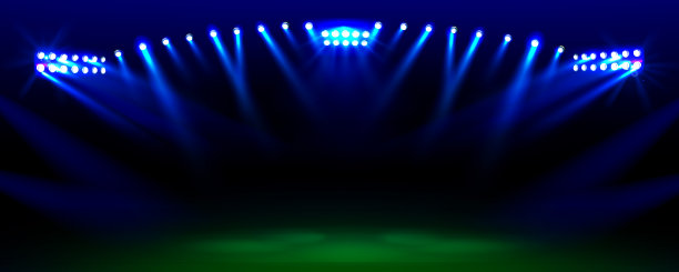 被泛光灯照亮的足球场图片下载