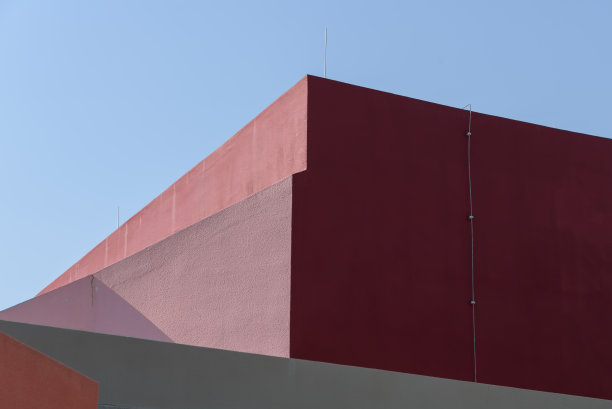 在不同深浅的红色建筑物的侧面的抽象照片图片下载