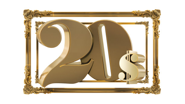 金色的20美元放在金色的巴洛克式画框上，孤立在白色的背景上图片下载