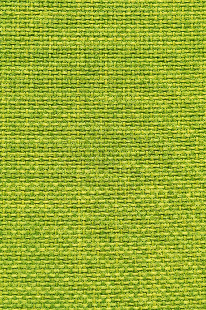丝绒绿色面料的纹理背景。织物质感的室内装潢家具纺织材料，室内设计，墙面装饰。面料纹理特写，垂直照片。图片下载