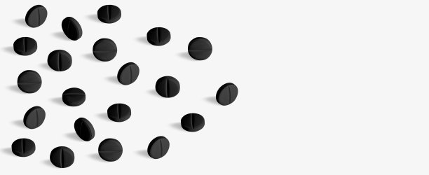 黑色胶囊、药片和片剂。在浅色背景上。图片下载