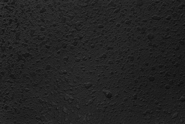 粗糙的黑色油漆滴背景微距照片图片下载