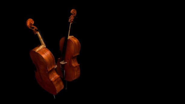 黑色背景上的大提琴，随着华尔兹舞曲的节奏起舞，幻想，古典音乐的背景图片下载