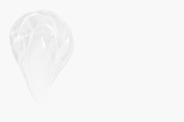 涂抹透明化妆品凝胶。在浅色背景上。图片下载