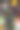特写图片无法辨认的人拿着自制的万圣节，白色巧克力片，盘子上的黑可可饼干，装饰着粉红色，绿色和橙色的糖果涂层的巧克力糖果，塑料蜘蛛，蜘蛛网，毛绒南瓜，高架视图图片下载