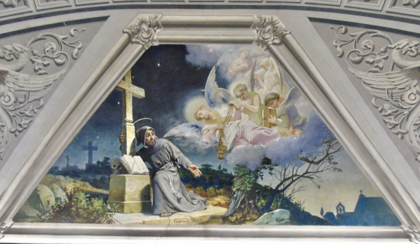 圣弗朗西斯大教堂的一幅天花板壁画描绘了一位手持金色香炉的飞行天使，头顶上是一位跪在十字架旁的圣徒。图片下载