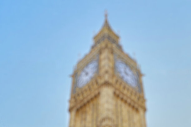 近距离低角度看散焦的大本钟钟楼为背景模板图片下载