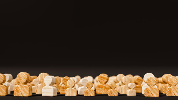 黑色的舞台上，人们聚集在一起，代表着伙伴关系和团队精神图片下载