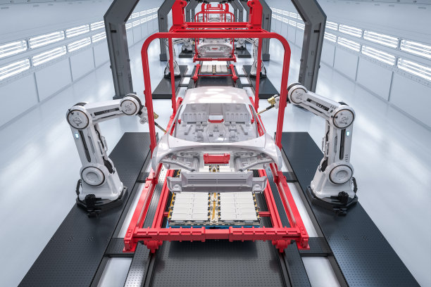 用机器人装配线生产电动汽车的自动化汽车厂图片下载